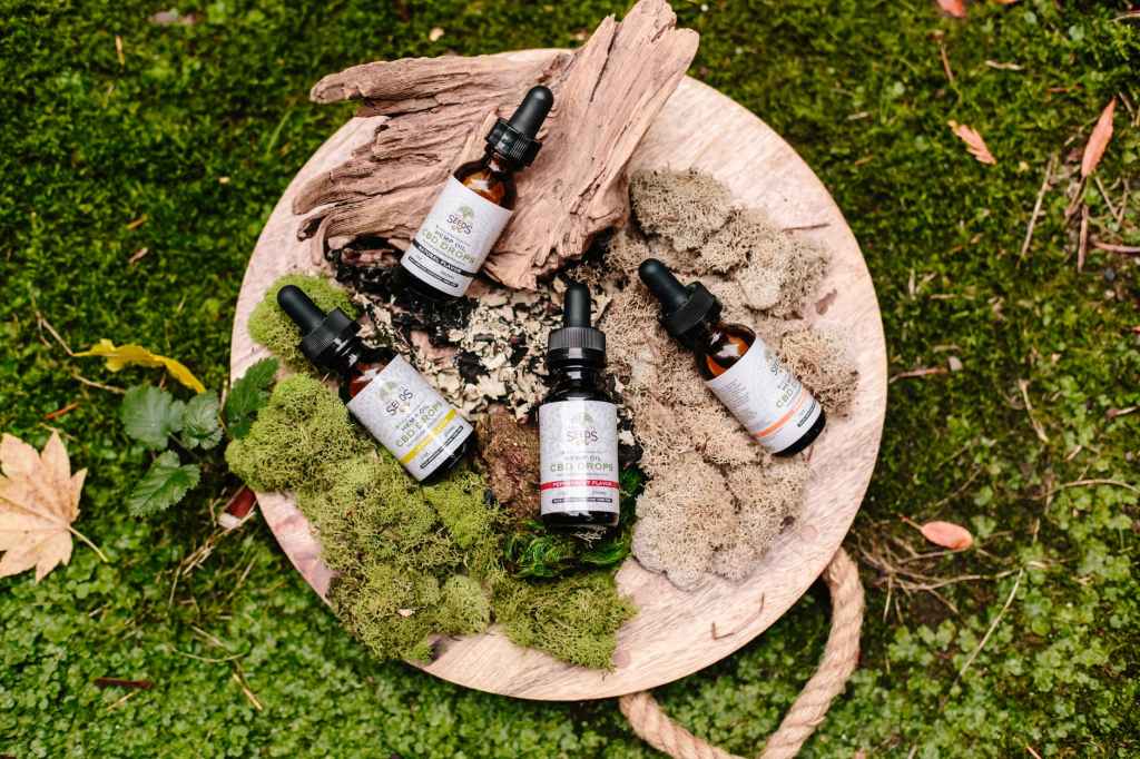 CBD Magic Products Here splash photography