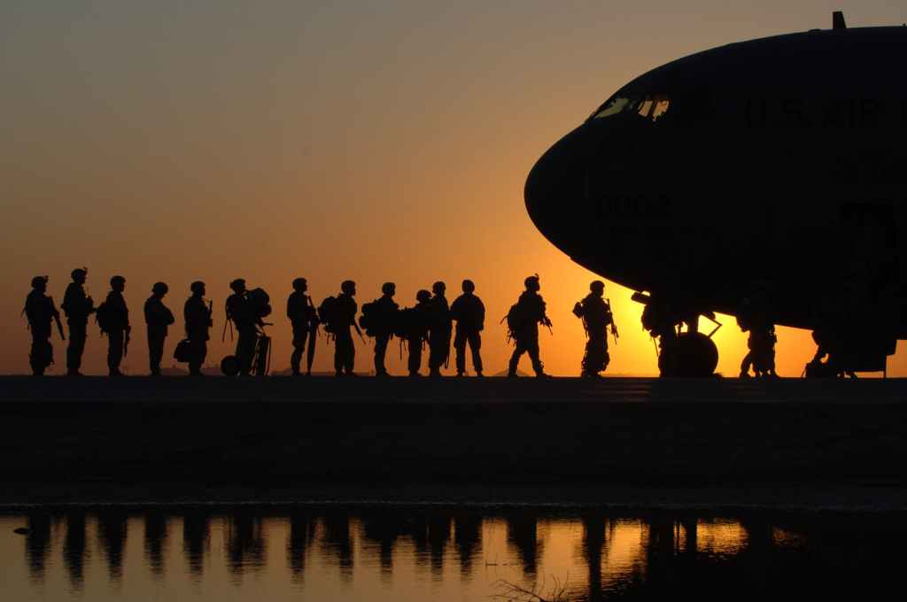 War and Soldiers boarding plan stock image from pexel