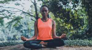 Girl meditating and focusing in this stock photography from WordPress