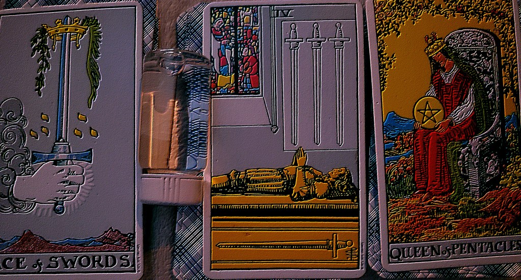 Tarot spread during January 21st of Ace of Swords, 4 of Swords and the Queen of pentacles by Rider Waite Tarot Deck