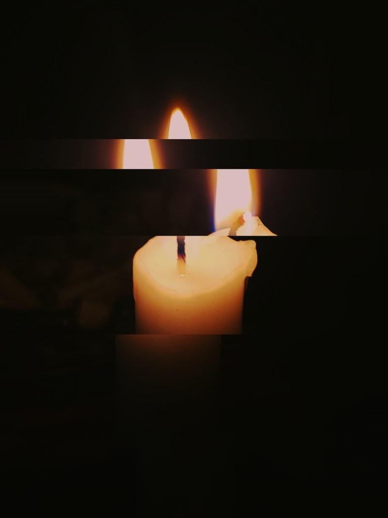 Koho Promi Glitched image if a candle burning